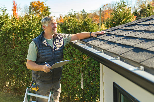 Professional Roofing technician working in Lester, IA